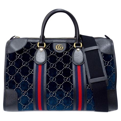 gucci medium gg velvet duffle|Medium GG duffle bag in beige and ebony GG canvas .